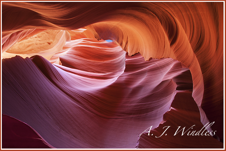 The swirling texture of Antelope Canyon seem to paint a blue-eyed and towering warrior.