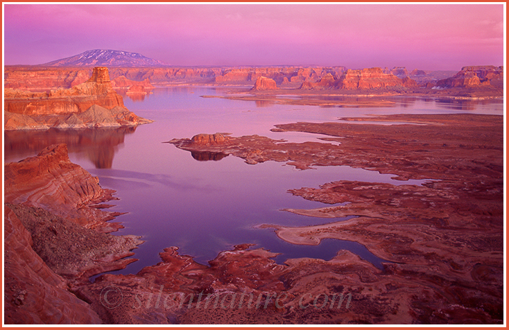 With thousands of miles of shoreline, Lake Powell at sunset would take an eternity to explore.